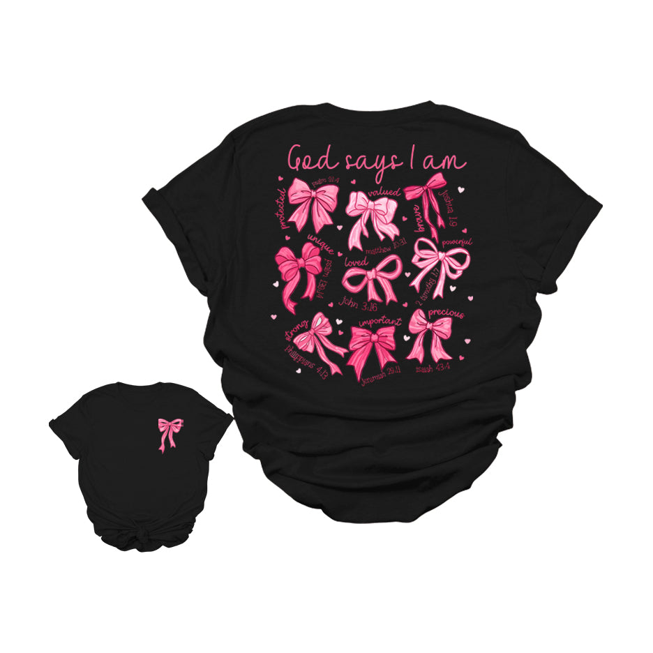 God Says I Am Christian Graphic T-Shirt | Faith-Based Bible Verse Bow Tee | Inspirational Scripture Shirt for Women | Cute Jesus Girl Aesthetic Tee | Uplifting Religious Affirmation T-Shirt