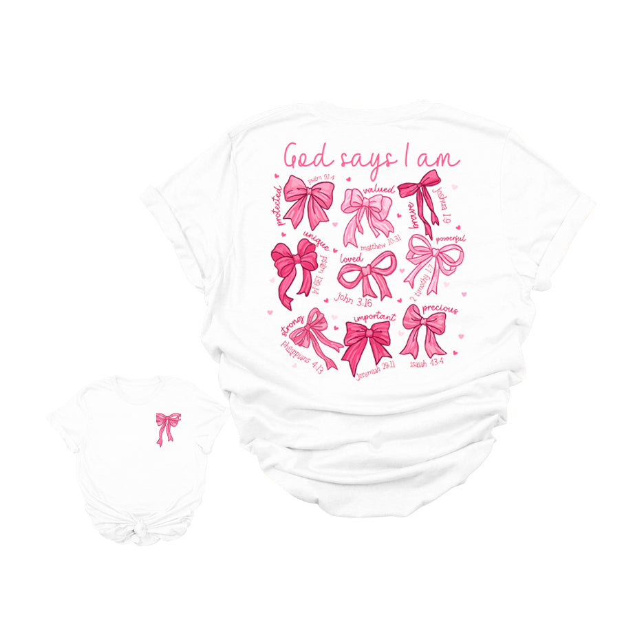 God Says I Am Christian Graphic T-Shirt | Faith-Based Bible Verse Bow Tee | Inspirational Scripture Shirt for Women | Cute Jesus Girl Aesthetic Tee | Uplifting Religious Affirmation T-Shirt